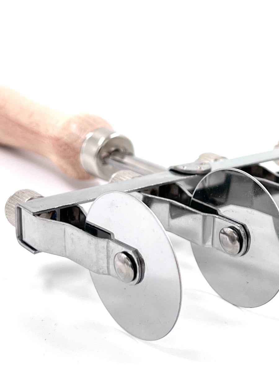 Säädettävä taikinaleikkuri